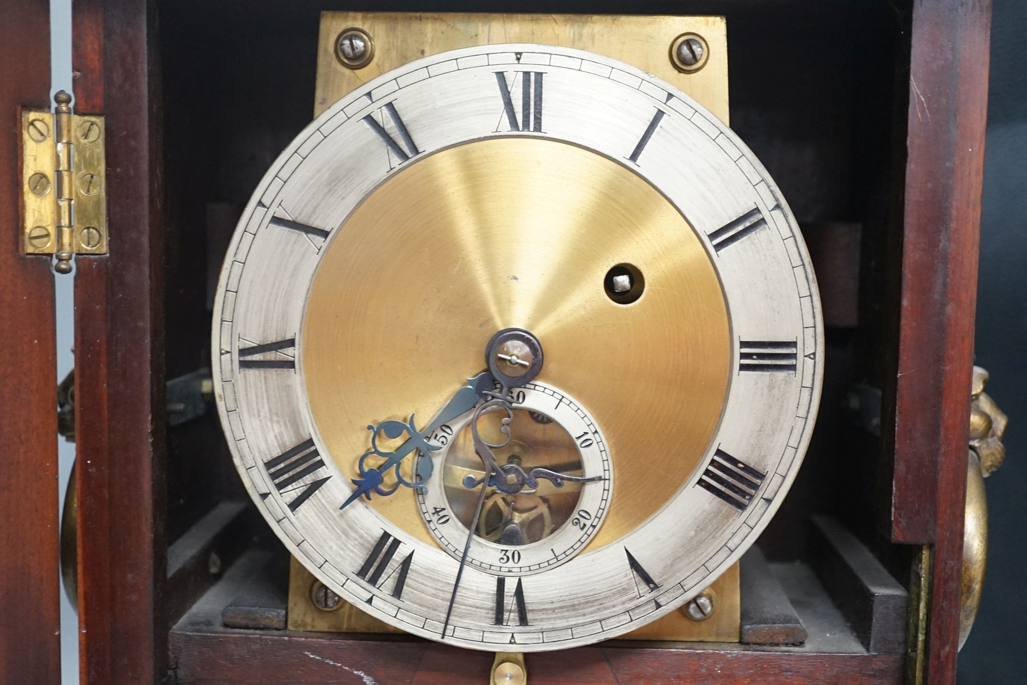 A mahogany and brass mounted bracket timepiece, 42cm, with adapted single fusee movement and visible wheel escapement
